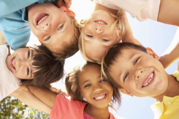 Jfo Group of five children giggling and smiling