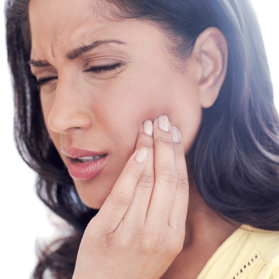 Orthodontics and tmjd: the hidden link 8 Woman in pain, holding jowl