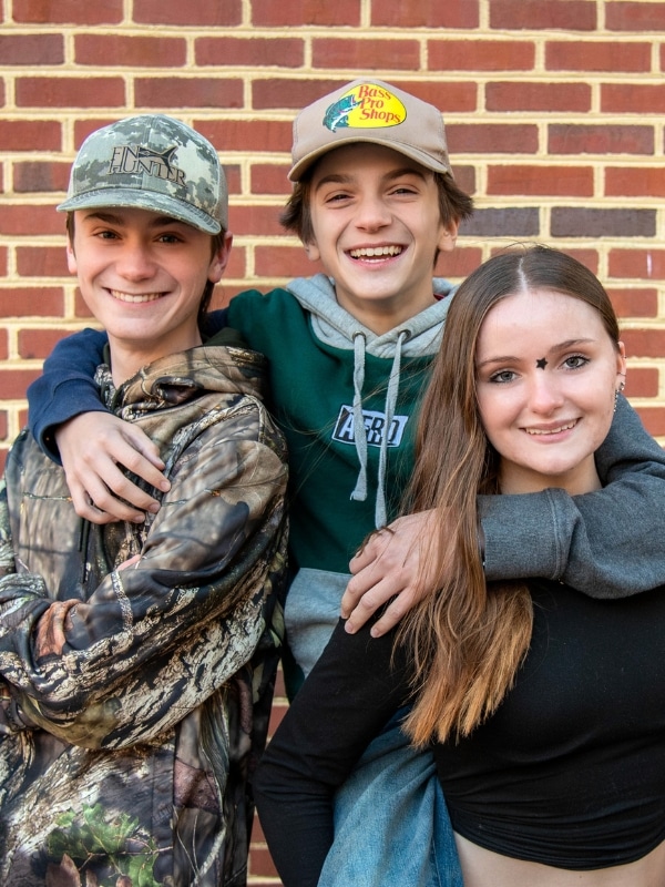 Jfo-patient-headshot-landon-lucas-hailey Siblings hugging smiling