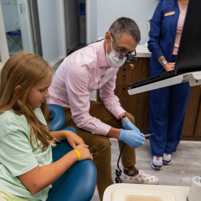 Our story at joosse family orthodontics: empowering patients through beautiful smiles 8 Dr. Joosse working with a patient, representing joosse family orthodontics