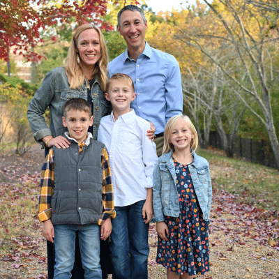 Understanding the gray baby tooth after trauma 7 Dr. Joosse and his family posing outside for a portrait, representing gray baby tooth after trauma
