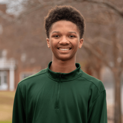 How to care for retainers in williamsburg 2 Teenage boy patient at jfo posing for a photo outside, representing how to care for retainers